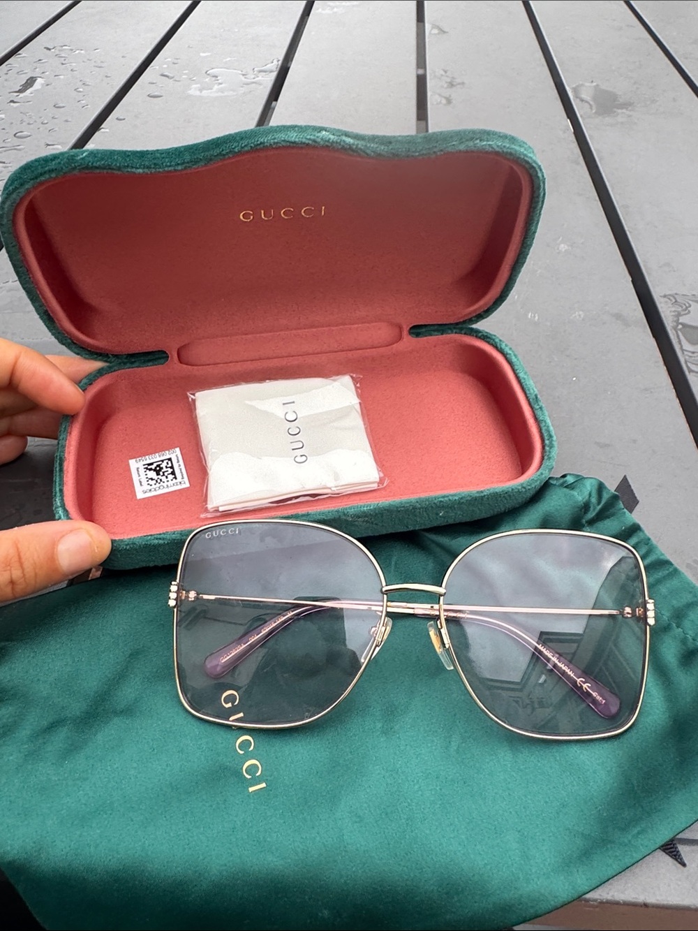 Gucci Gold-Frame Sunglasses with Green-Tinted Lenses